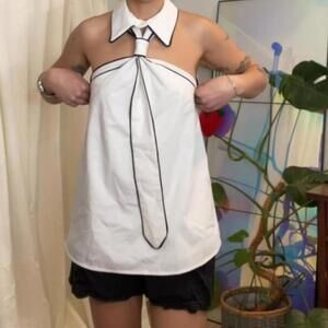 White tank top with black trim, collar, and tie, size medium